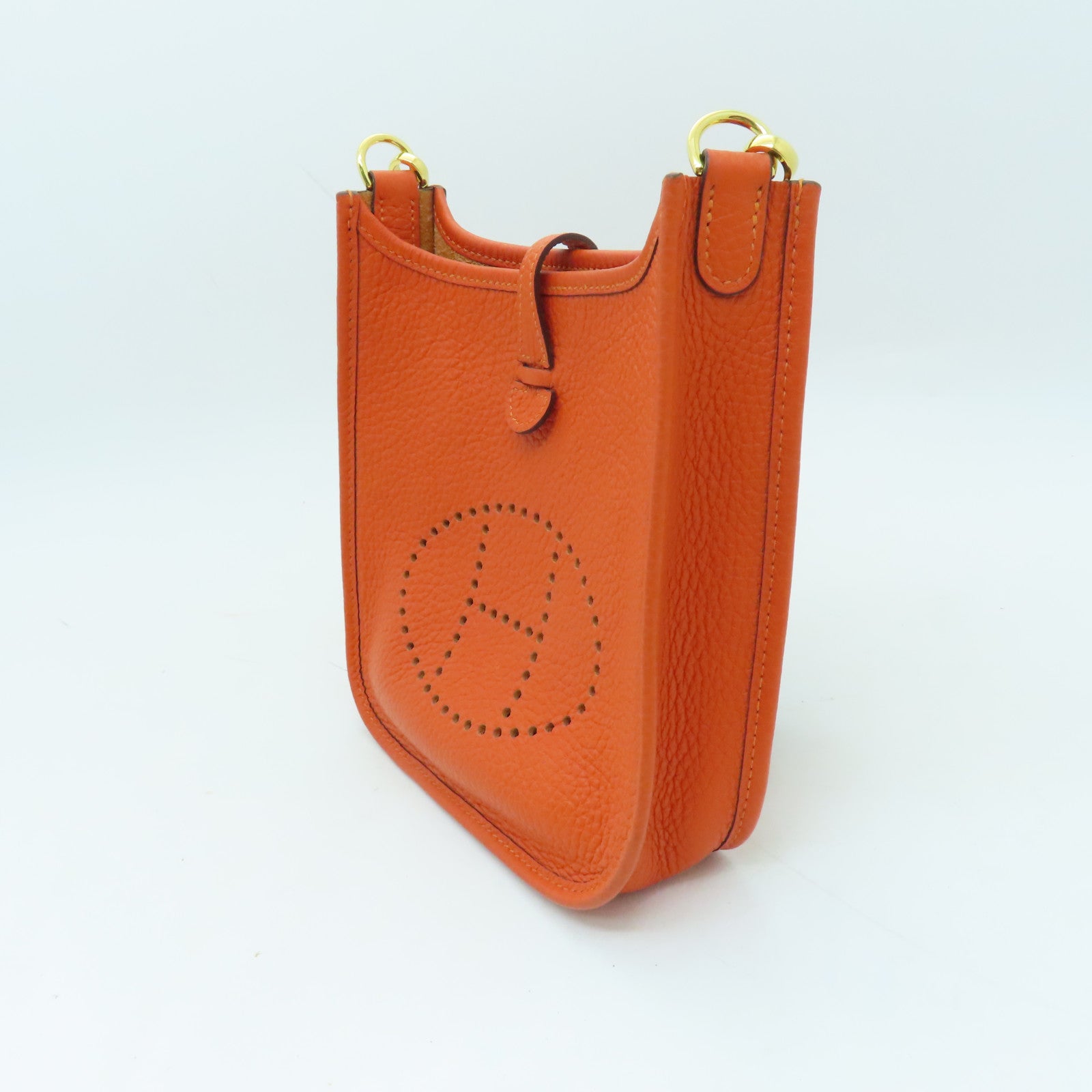 HERMES Clemence皮革Evelyne TPM金扣肩背袋火焰橘