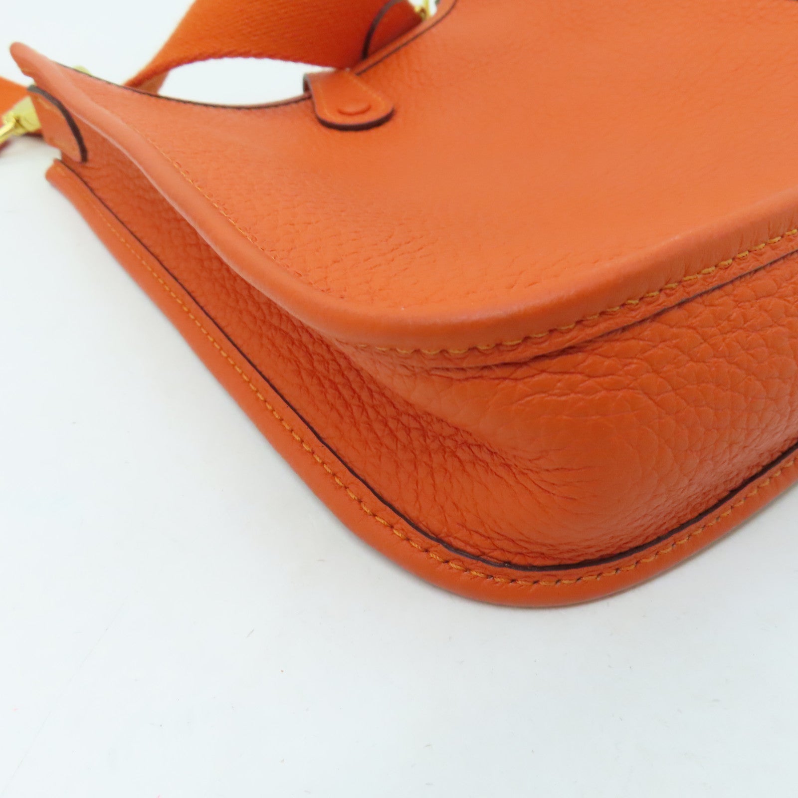 HERMES Clemence皮革Evelyne TPM金扣肩背袋火焰橘