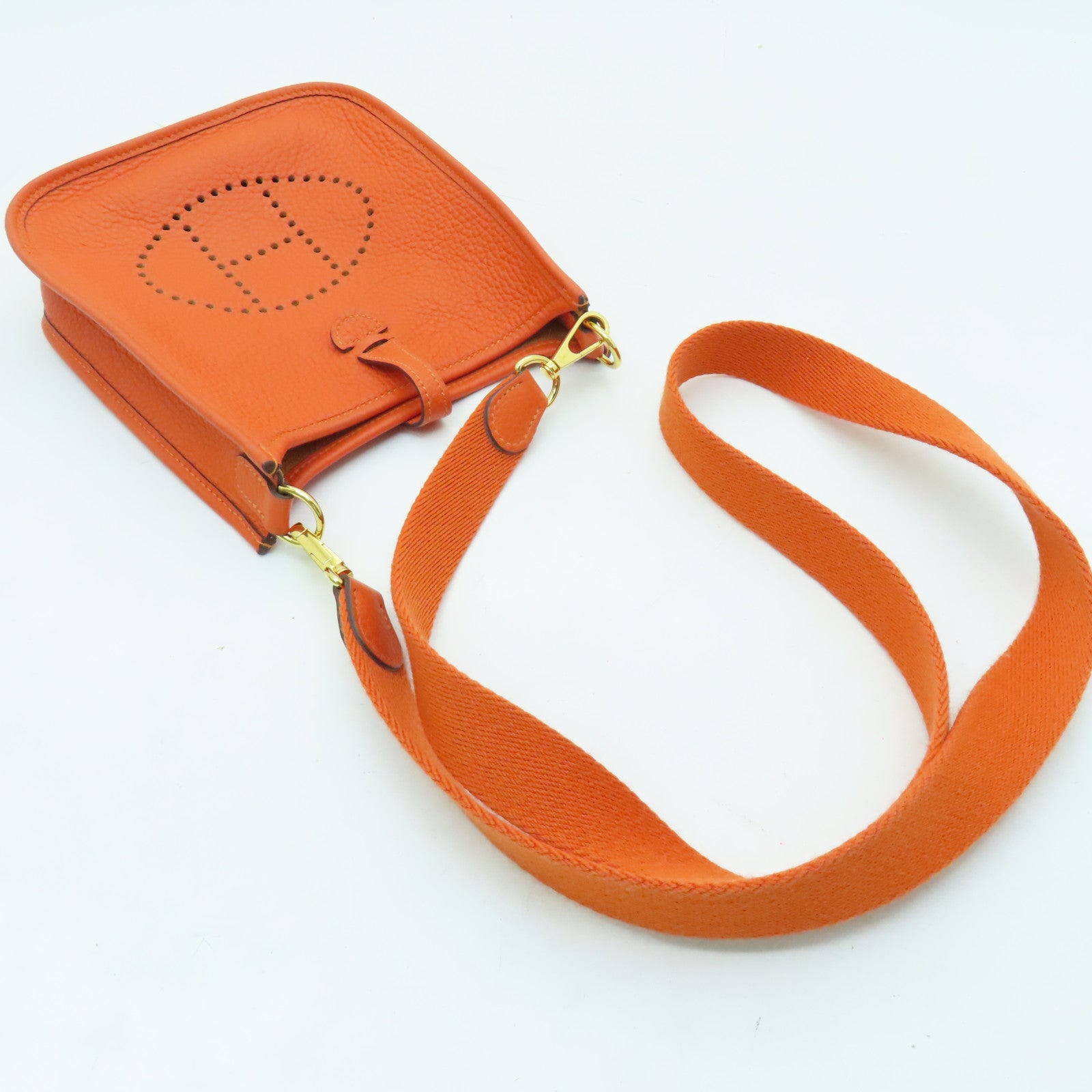 HERMES Clemence皮革Evelyne TPM金扣肩背袋火焰橘
