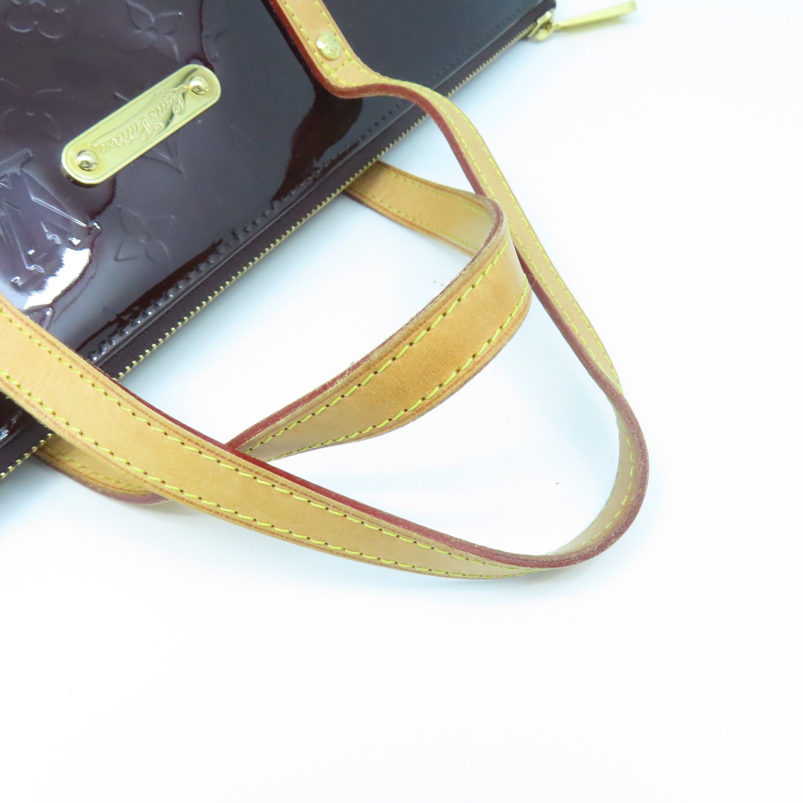 LOUIS VUITTON Monogram Vernis Bellevue PM gold buckle handle bag red