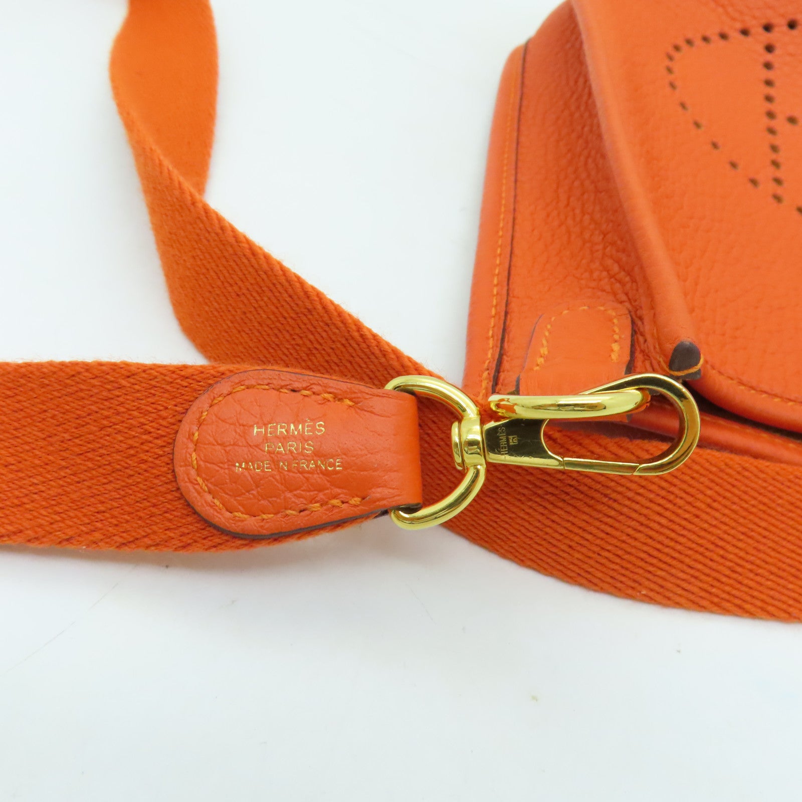 HERMES Clemence皮革Evelyne TPM金扣肩背袋火焰橘