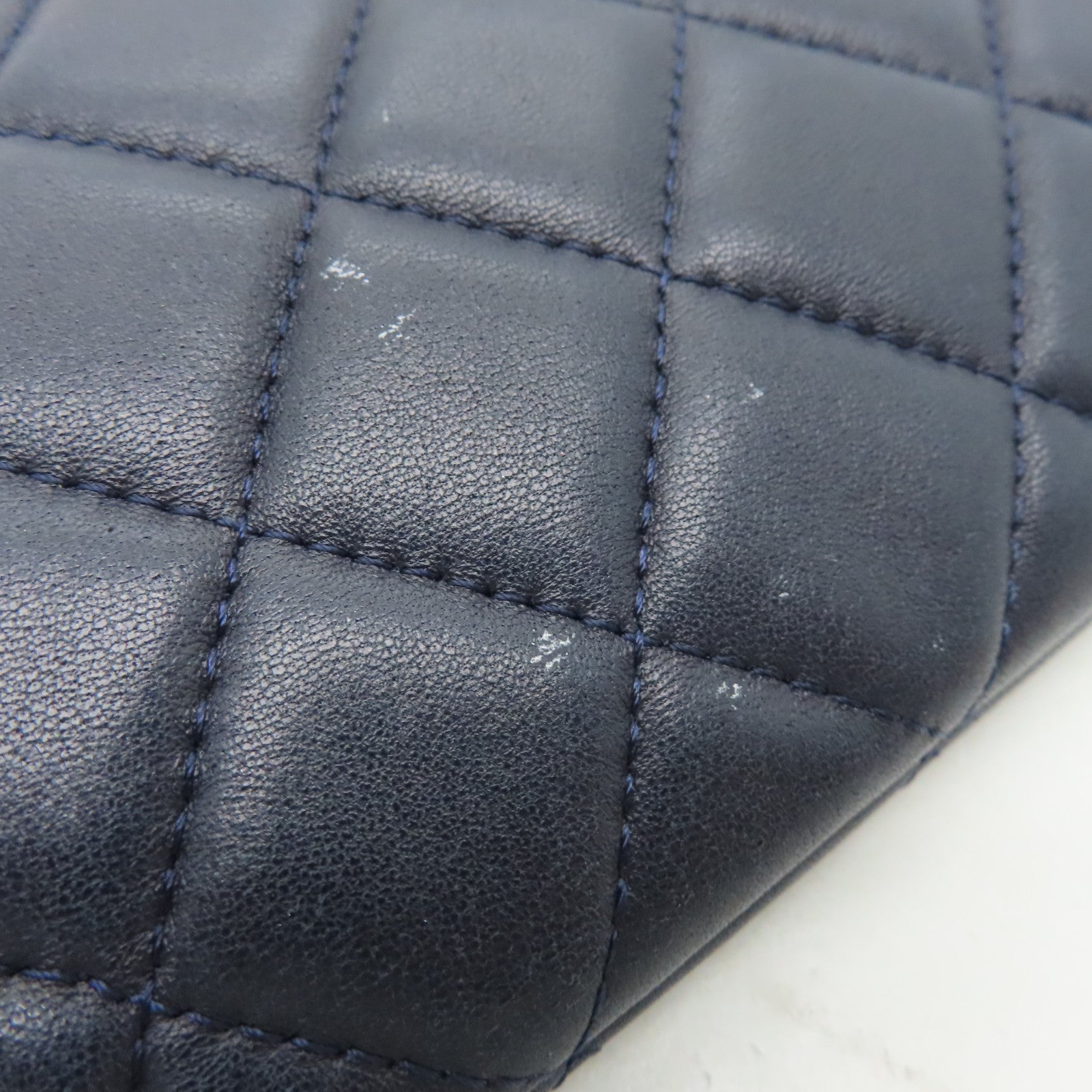 CHANEL rhombic sheepskin leather Pouch silver buckle cosmetic bag dark blue