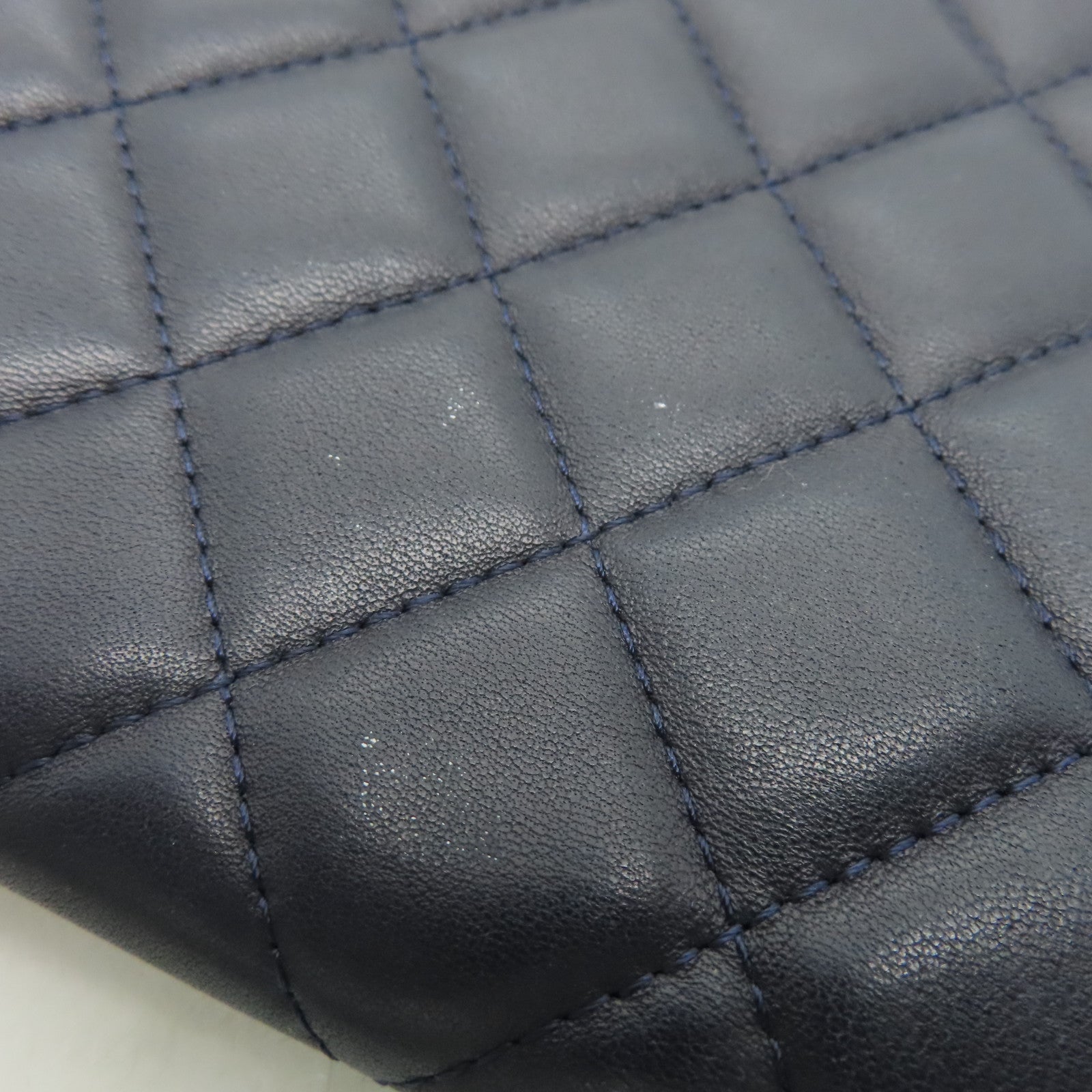 CHANEL rhombic sheepskin leather Pouch silver buckle cosmetic bag dark blue