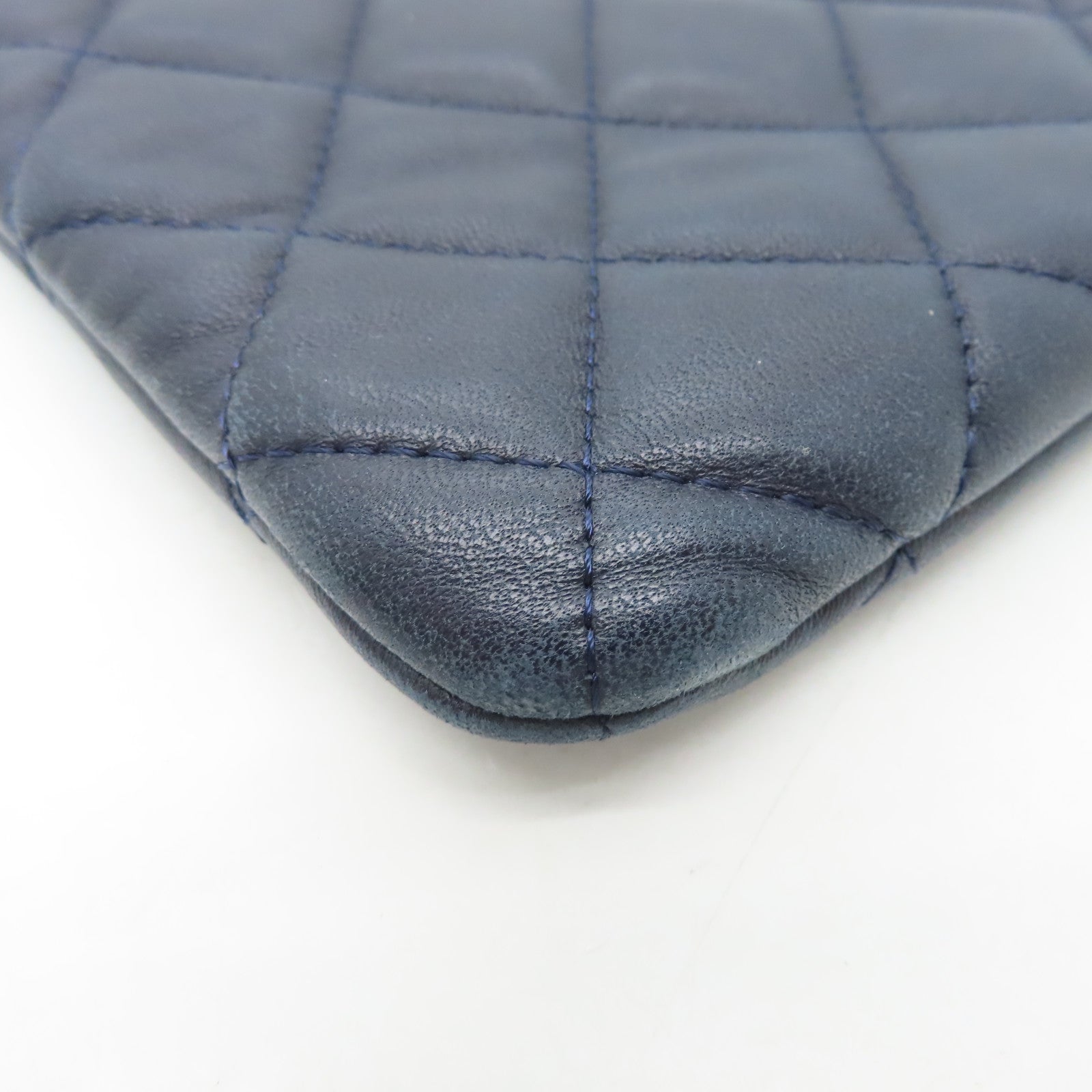 CHANEL rhombic sheepskin leather Pouch silver buckle cosmetic bag dark blue
