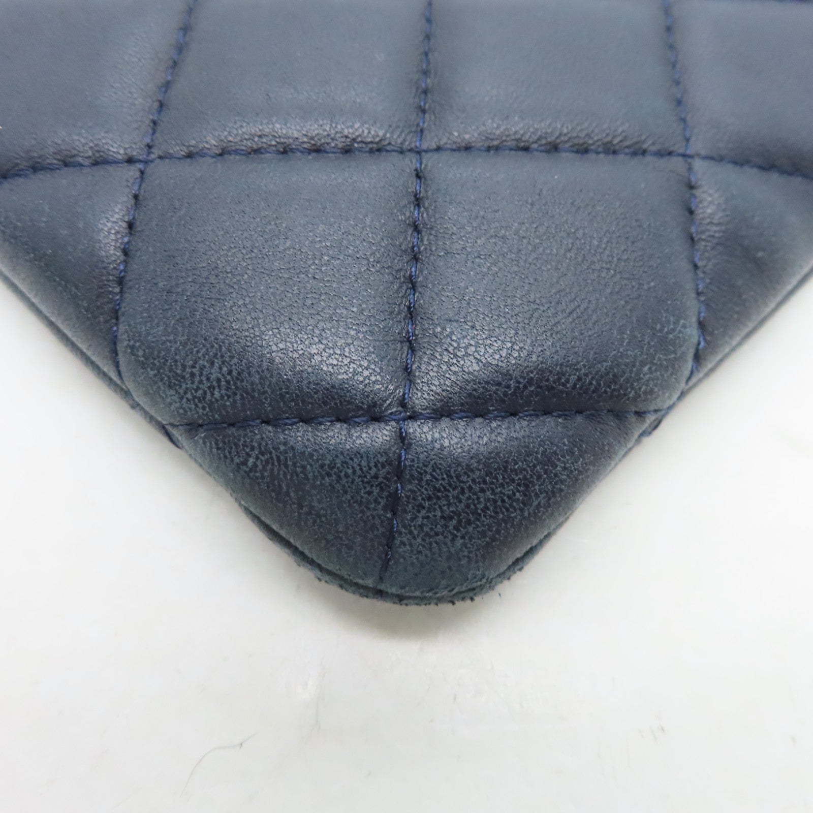 CHANEL rhombic sheepskin leather Pouch silver buckle cosmetic bag dark blue