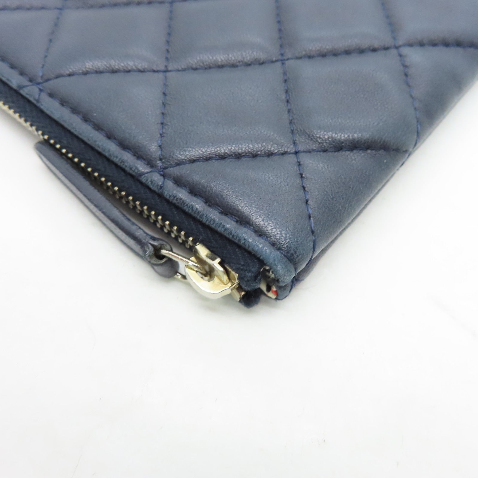 CHANEL rhombic sheepskin leather Pouch silver buckle cosmetic bag dark blue