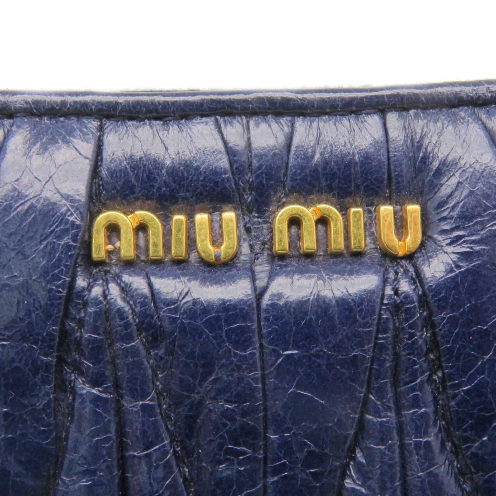 Miu Miu 牛皮皮革Clutch金扣手拿包宝蓝色