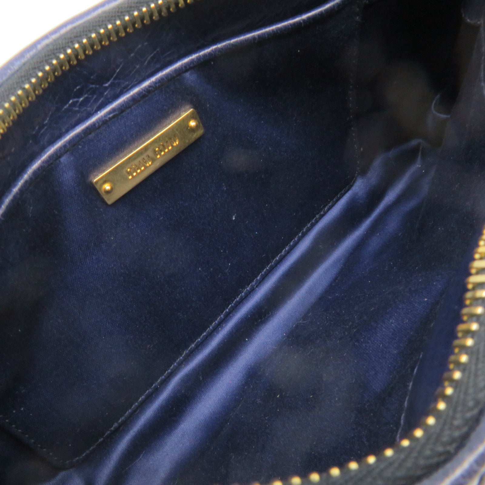 Miu Miu 牛皮皮革Clutch金扣手拿包宝蓝色