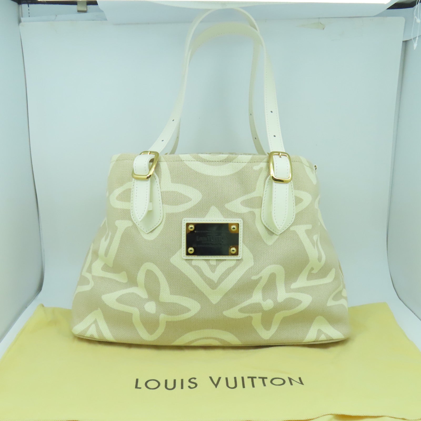 LOUIS VUITTON 帆布/皮革Tahitienne PM金扣手挽袋米色