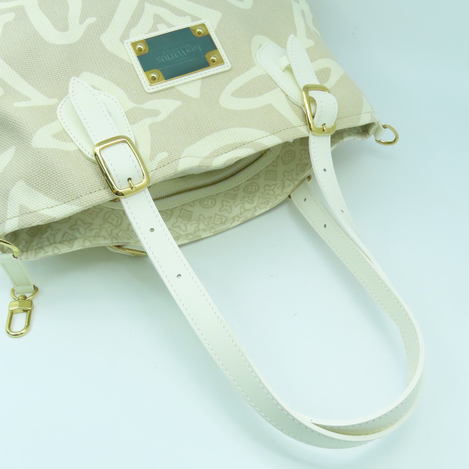 LOUIS VUITTON 帆布/皮革Tahitienne PM金扣手挽袋米色
