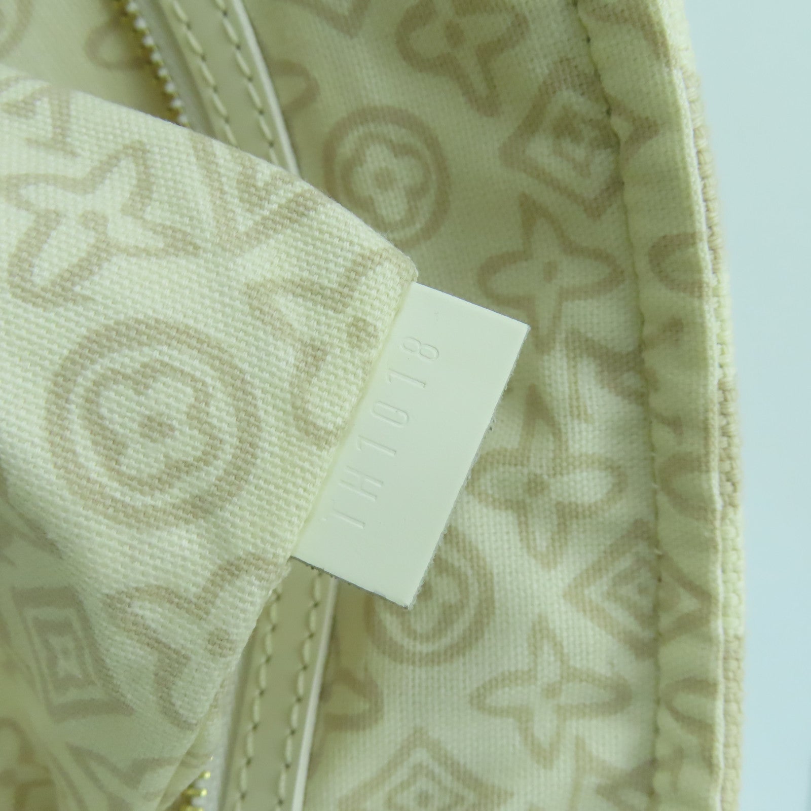 LOUIS VUITTON 帆布/皮革Tahitienne PM金扣手挽袋米色