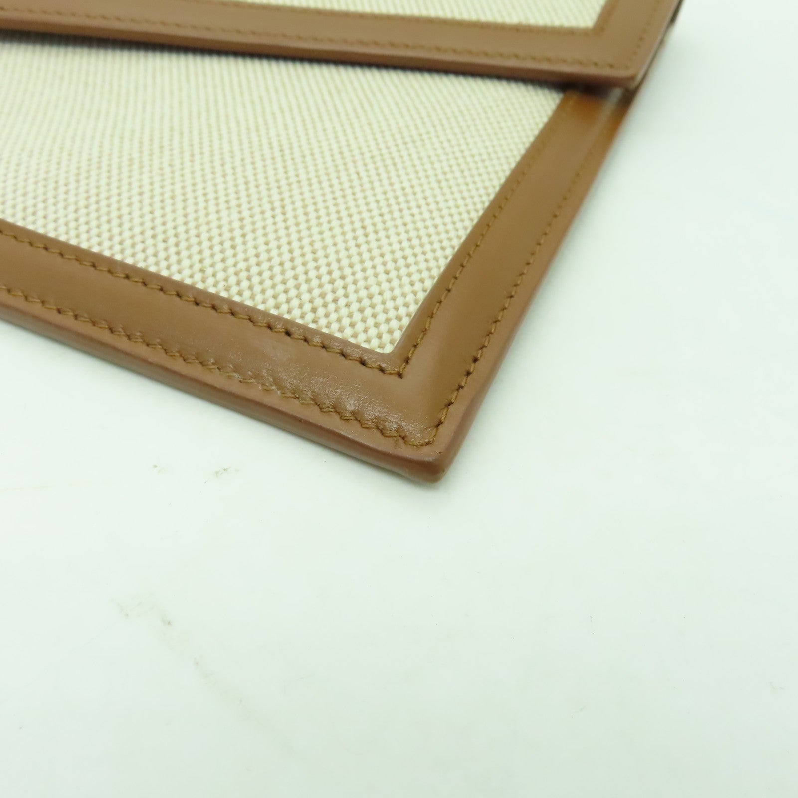 YVES SAINT LAURENT 帆布Clutch Bag金扣手拿包米色