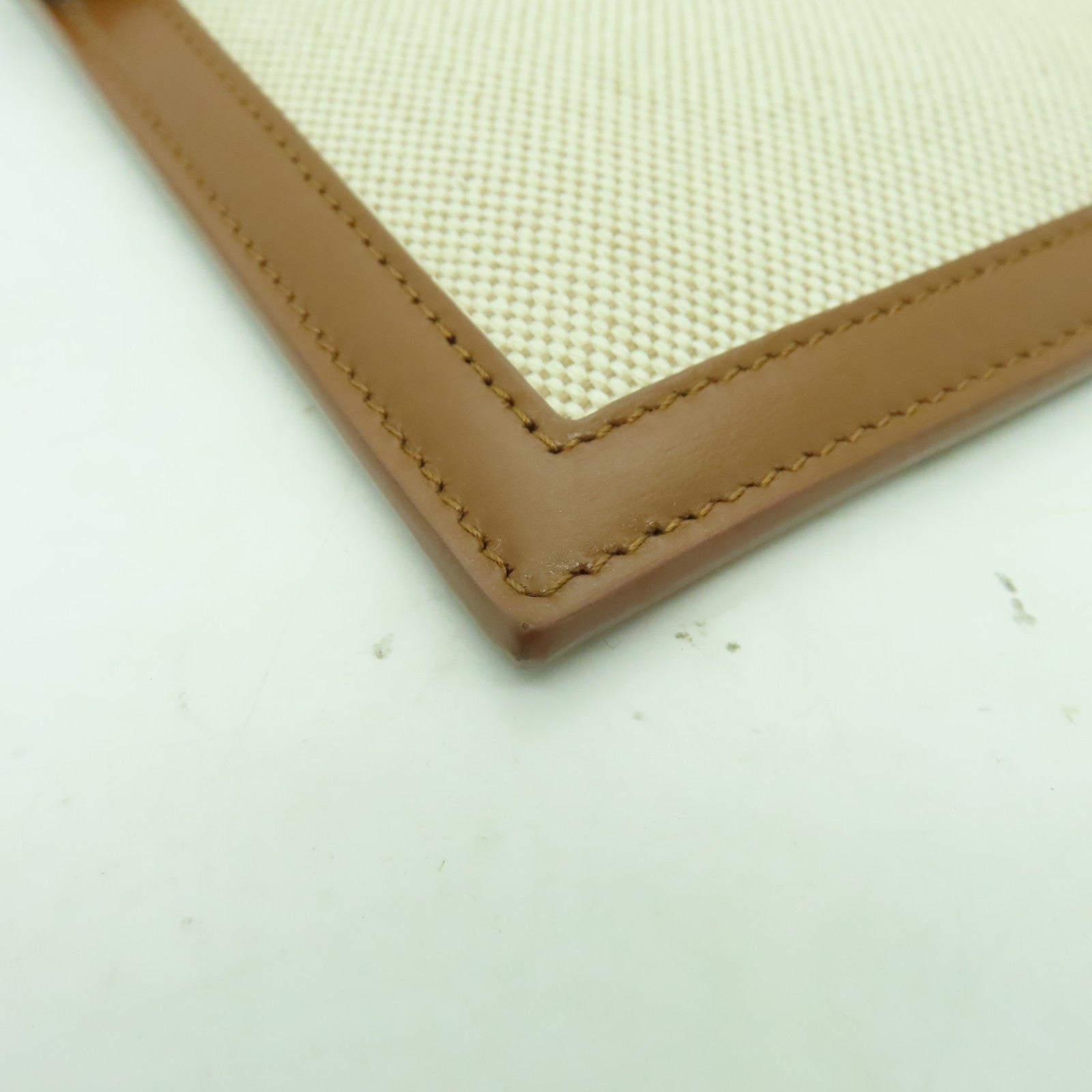 YVES SAINT LAURENT 帆布Clutch Bag金扣手拿包米色