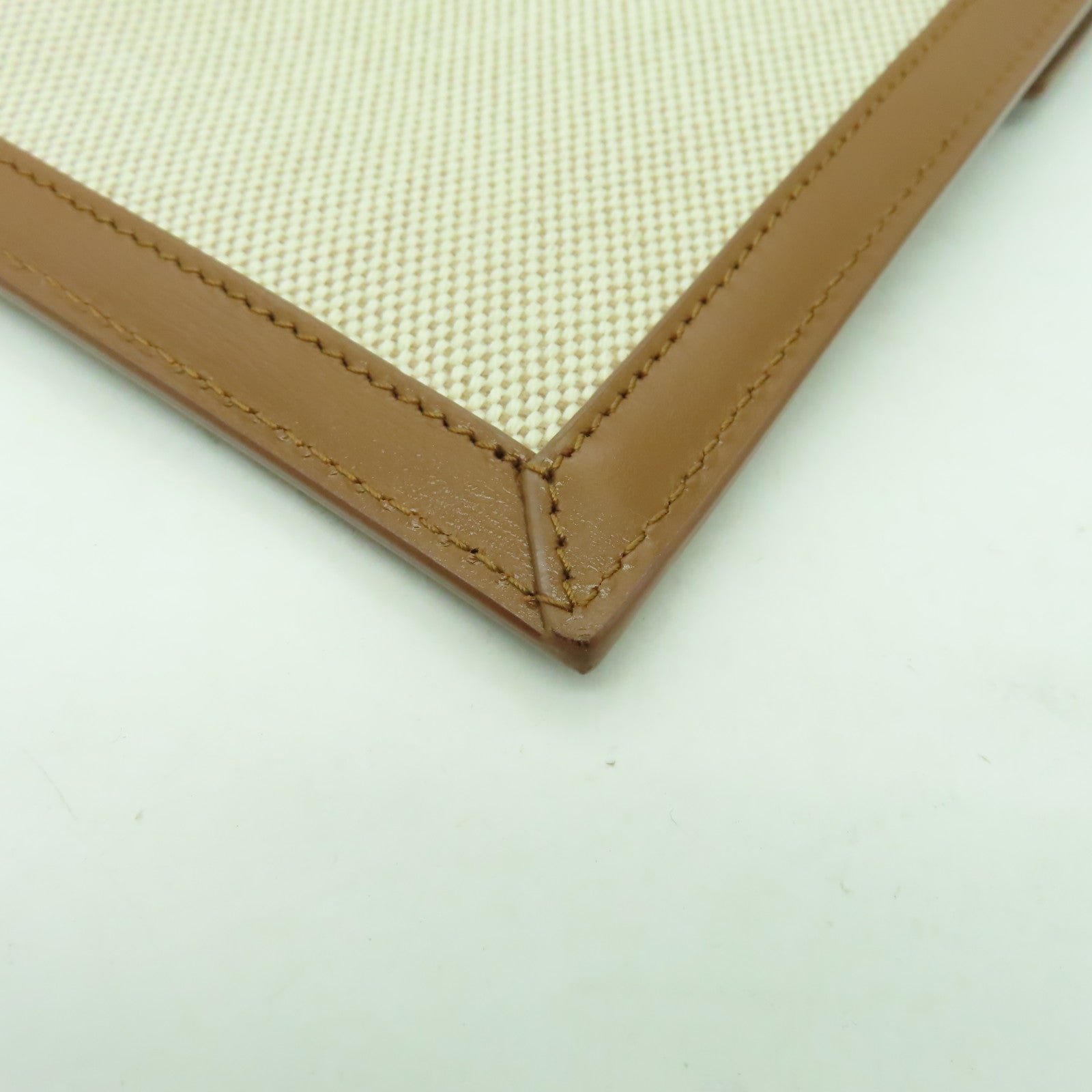 YVES SAINT LAURENT 帆布Clutch Bag金扣手拿包米色
