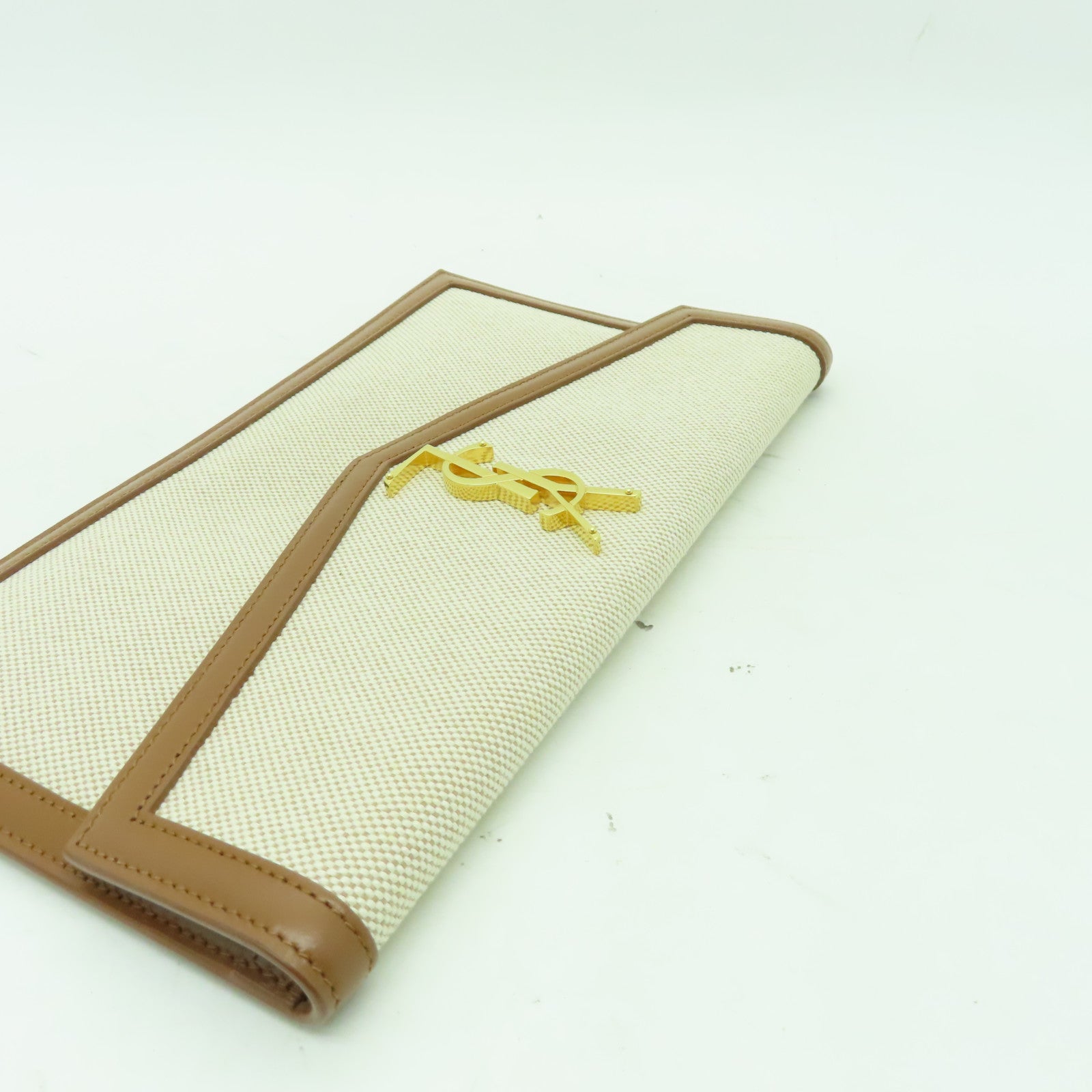 YVES SAINT LAURENT 帆布Clutch Bag金扣手拿包米色