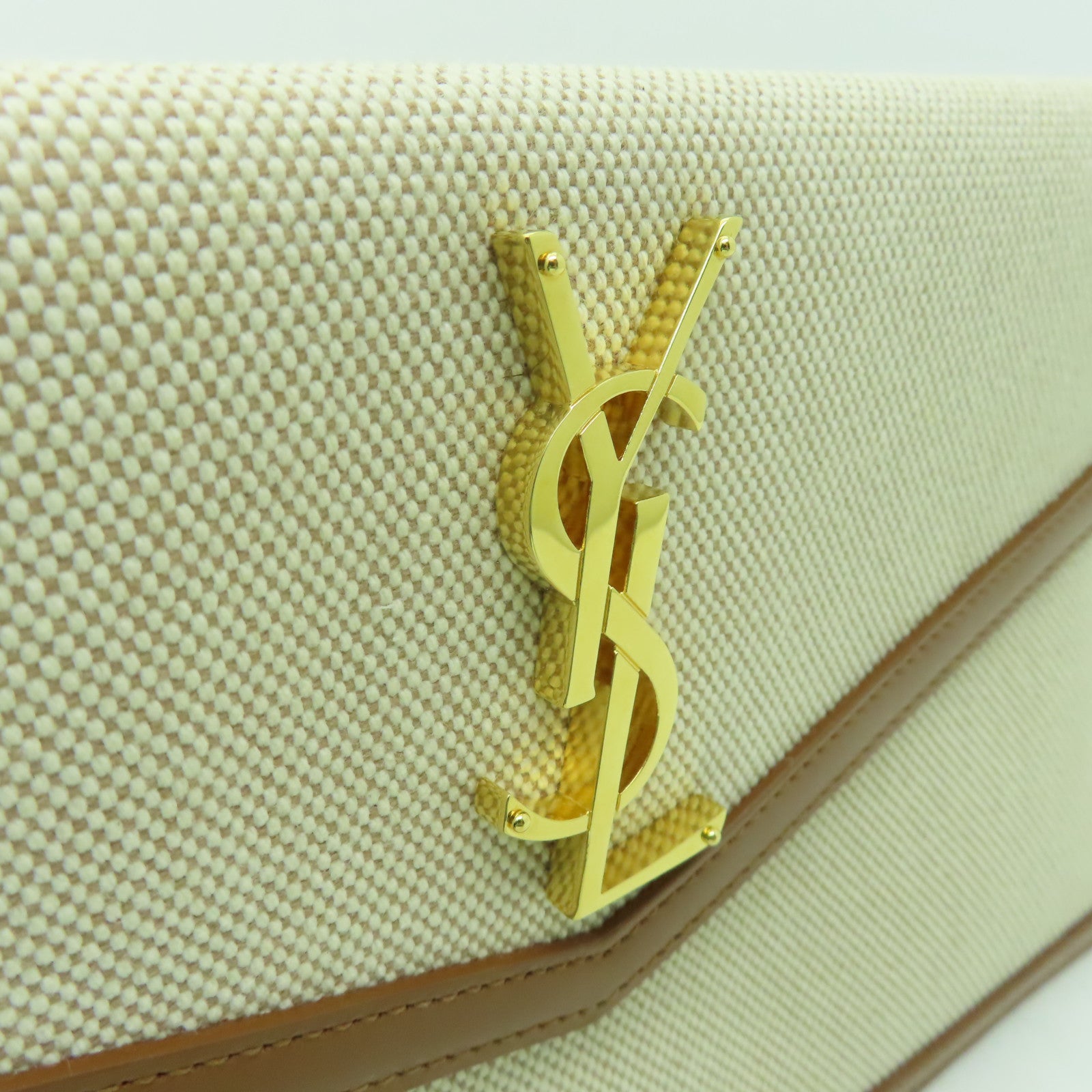 YVES SAINT LAURENT 帆布Clutch Bag金扣手拿包米色