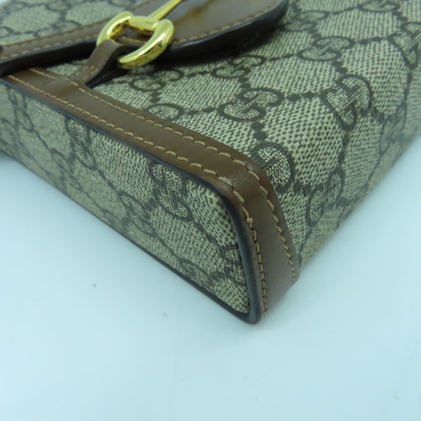 GUCCI 塗層帆布Mini Horsebit 1955金扣肩背袋啡色