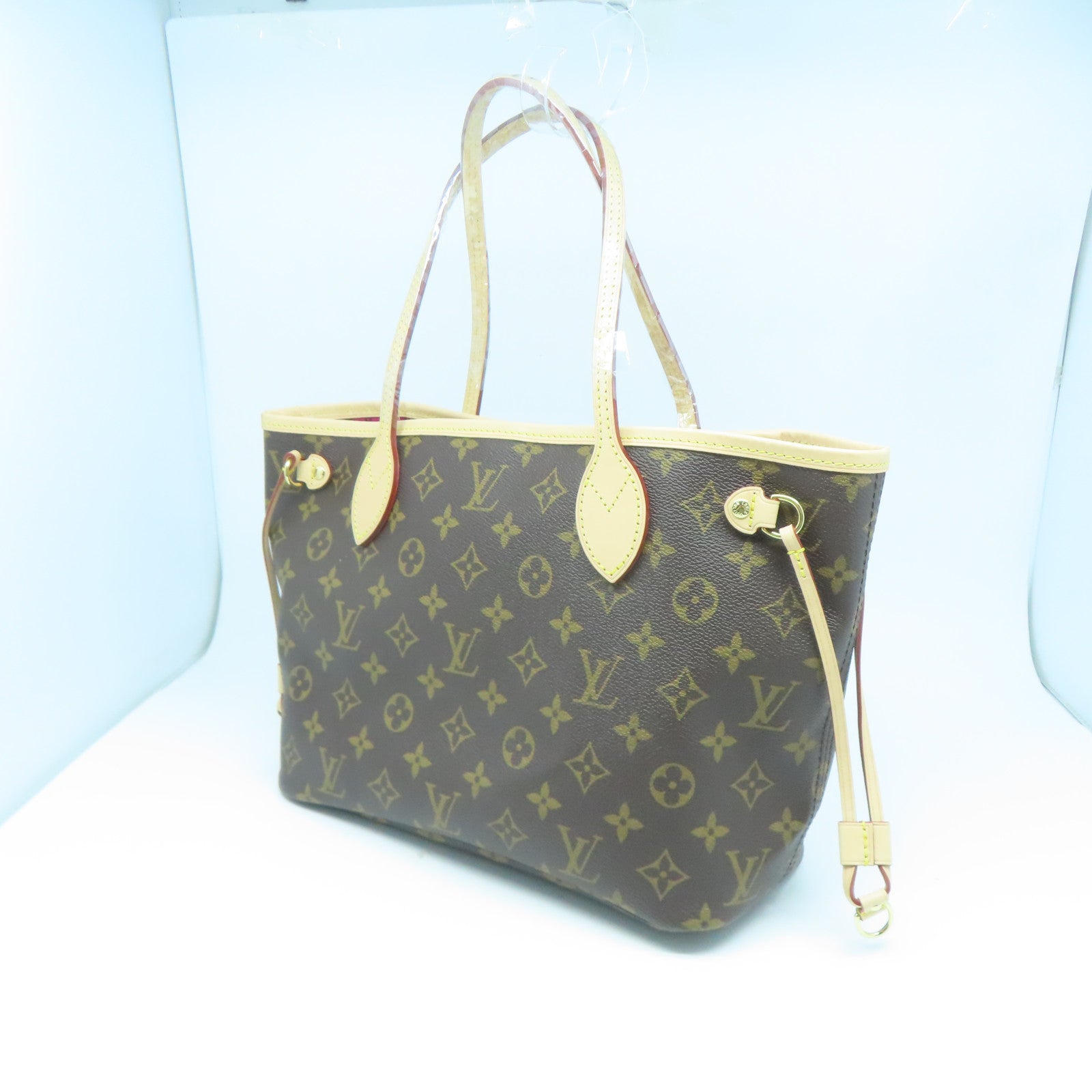LOUIS VUITTON Monogram Neverfull PM金扣手挽袋棕色