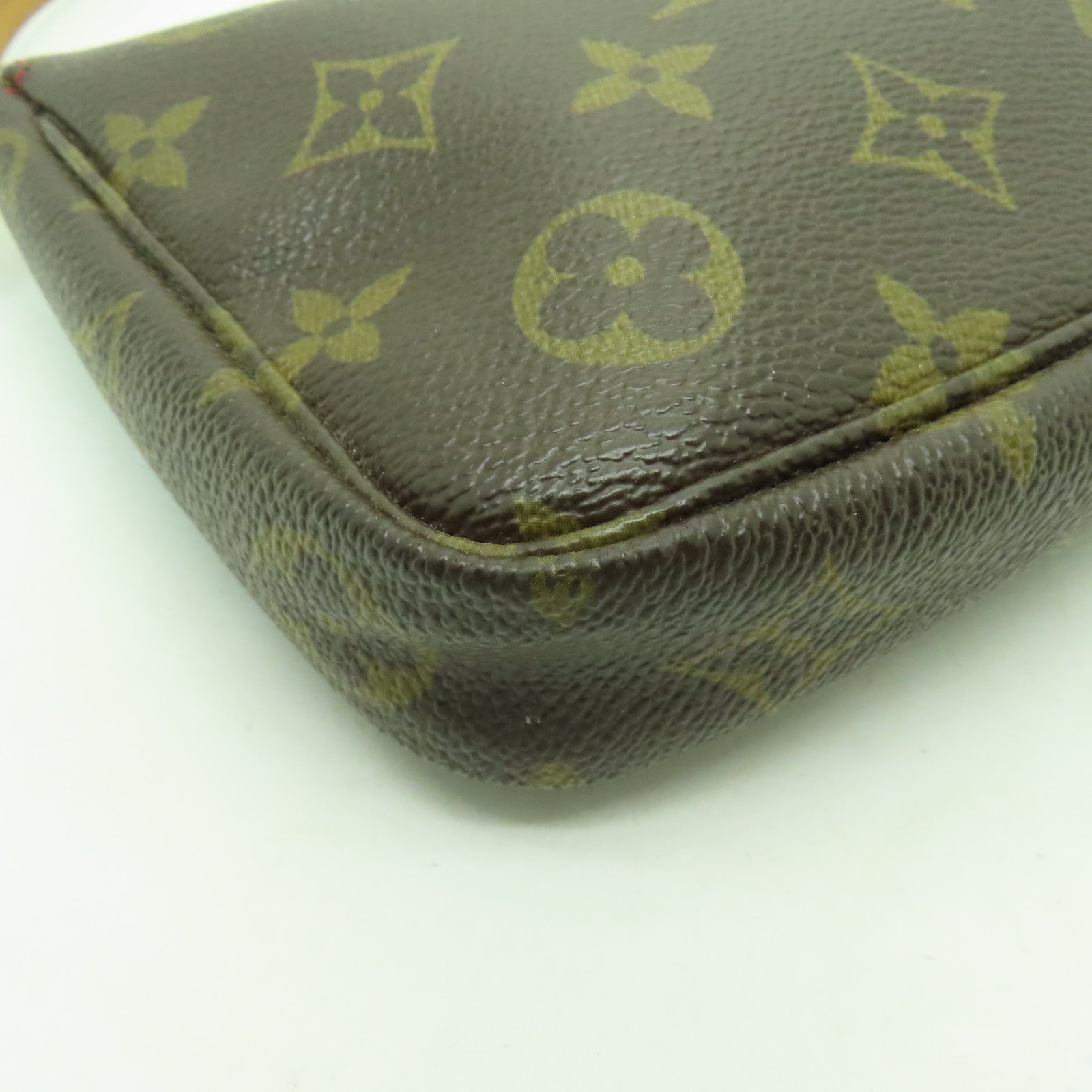 LOUIS VUITTON Monogram Pochette Accessories金扣手挽袋棕色