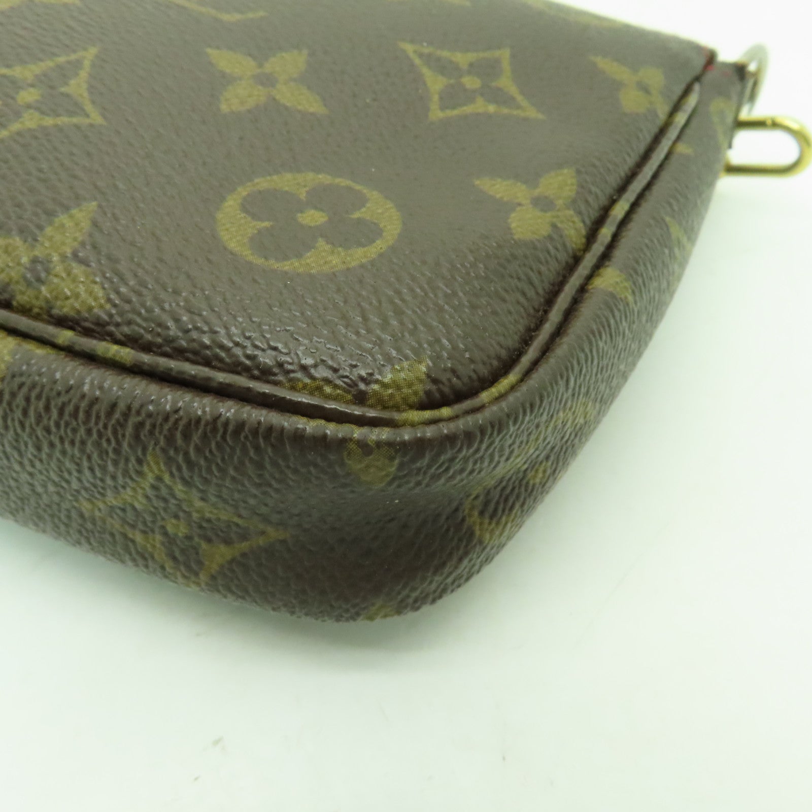 LOUIS VUITTON Monogram Pochette Accessories金扣手挽袋棕色