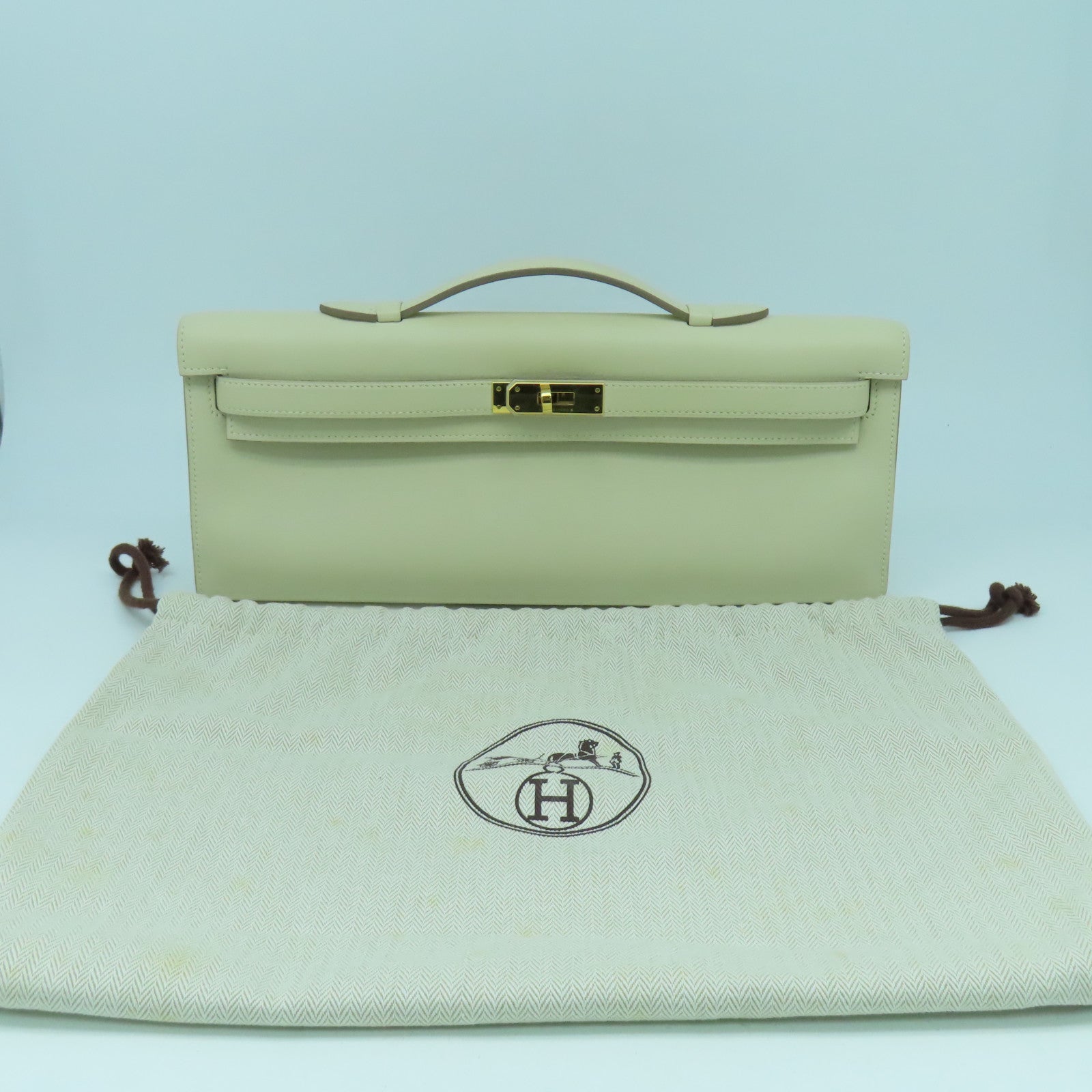 HERMES Swift皮革Kelly Cut金扣手挽袋奶昔白