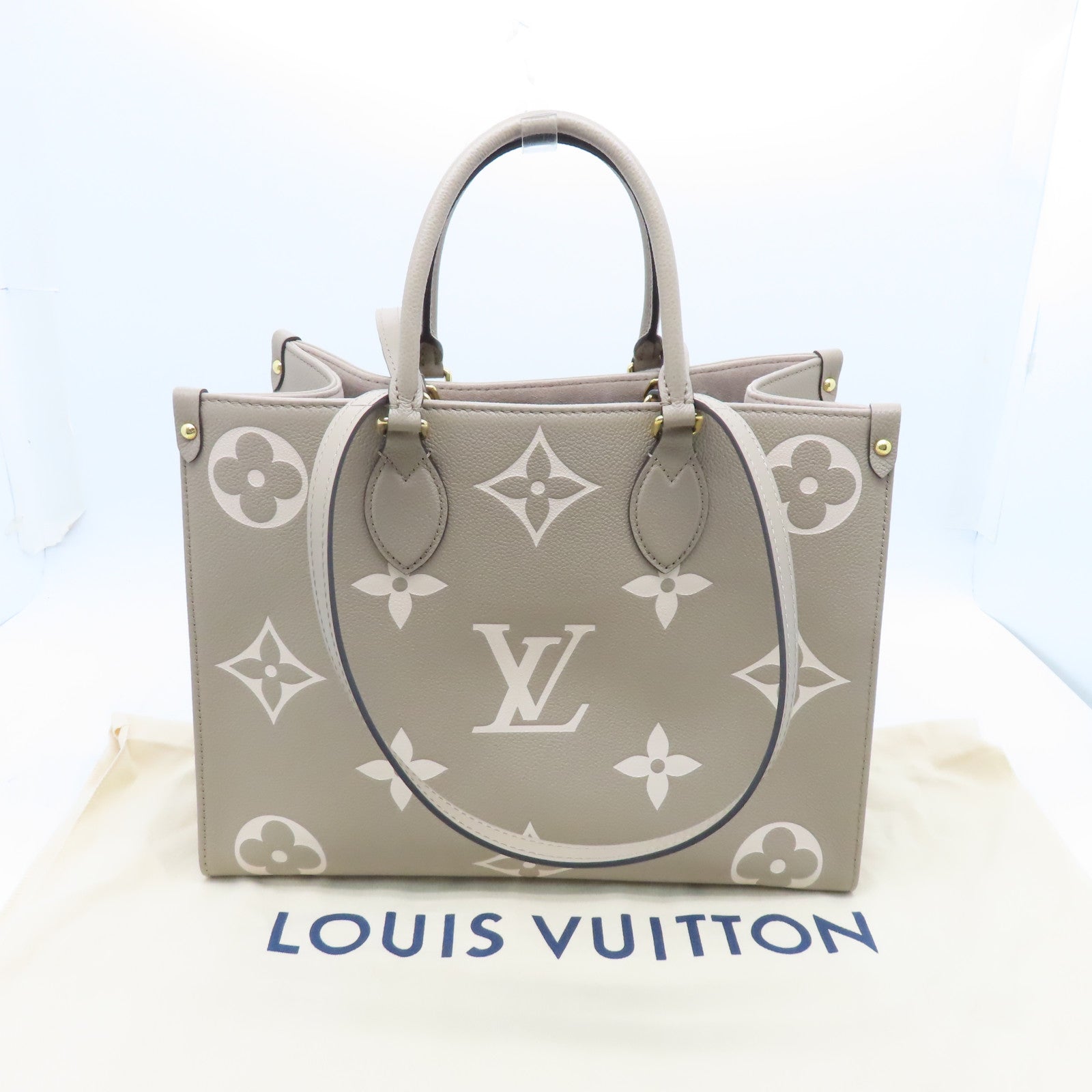 LOUIS VUITTON Monogram Empreinte Omthego MM Gold Buckle Handle Shoulder Backpack Beige
