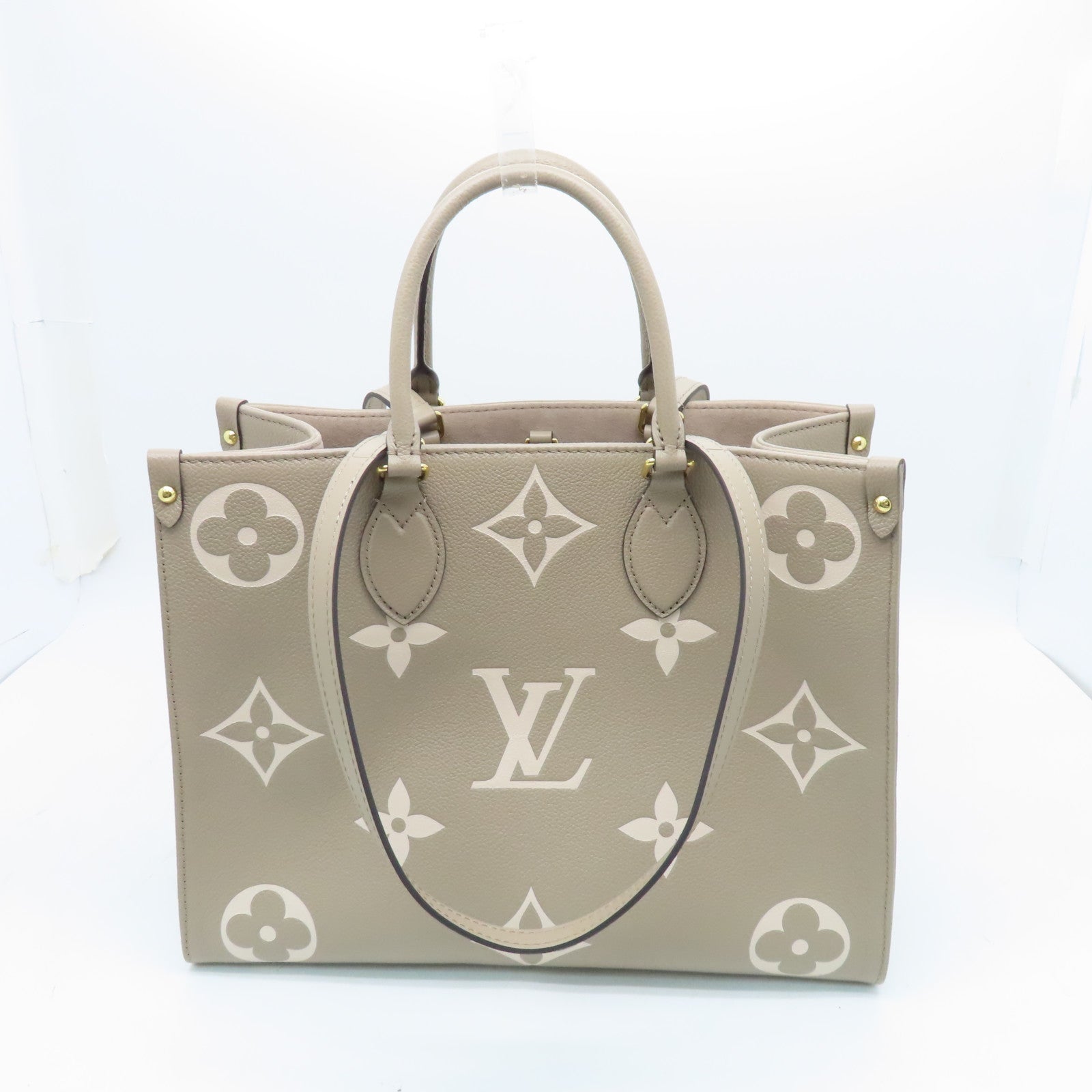 LOUIS VUITTON Monogram Empreinte Omthego MM Gold Buckle Handle Shoulder Backpack Beige