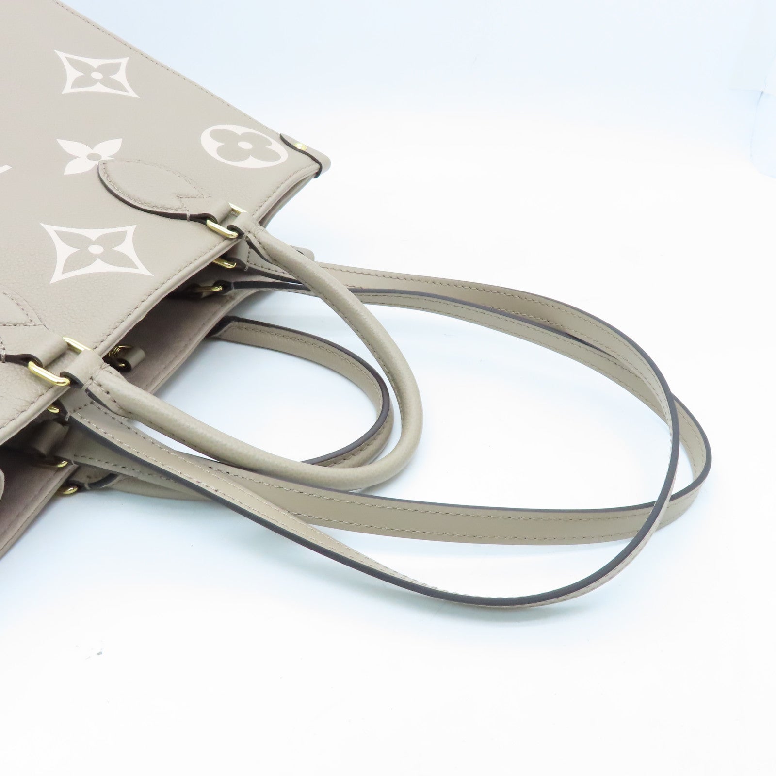 LOUIS VUITTON Monogram Empreinte Omthego MM Gold Buckle Handle Shoulder Backpack Beige