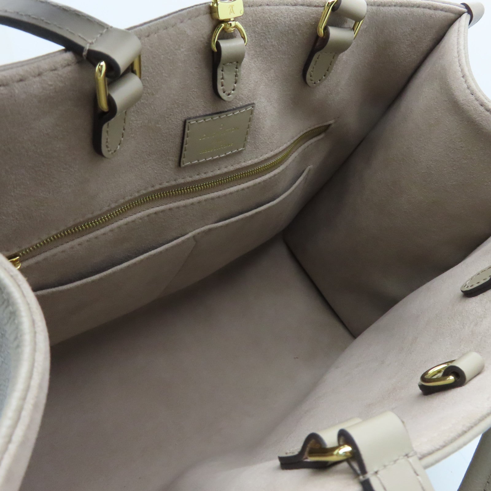 LOUIS VUITTON Monogram Empreinte Omthego MM Gold Buckle Handle Shoulder Backpack Beige