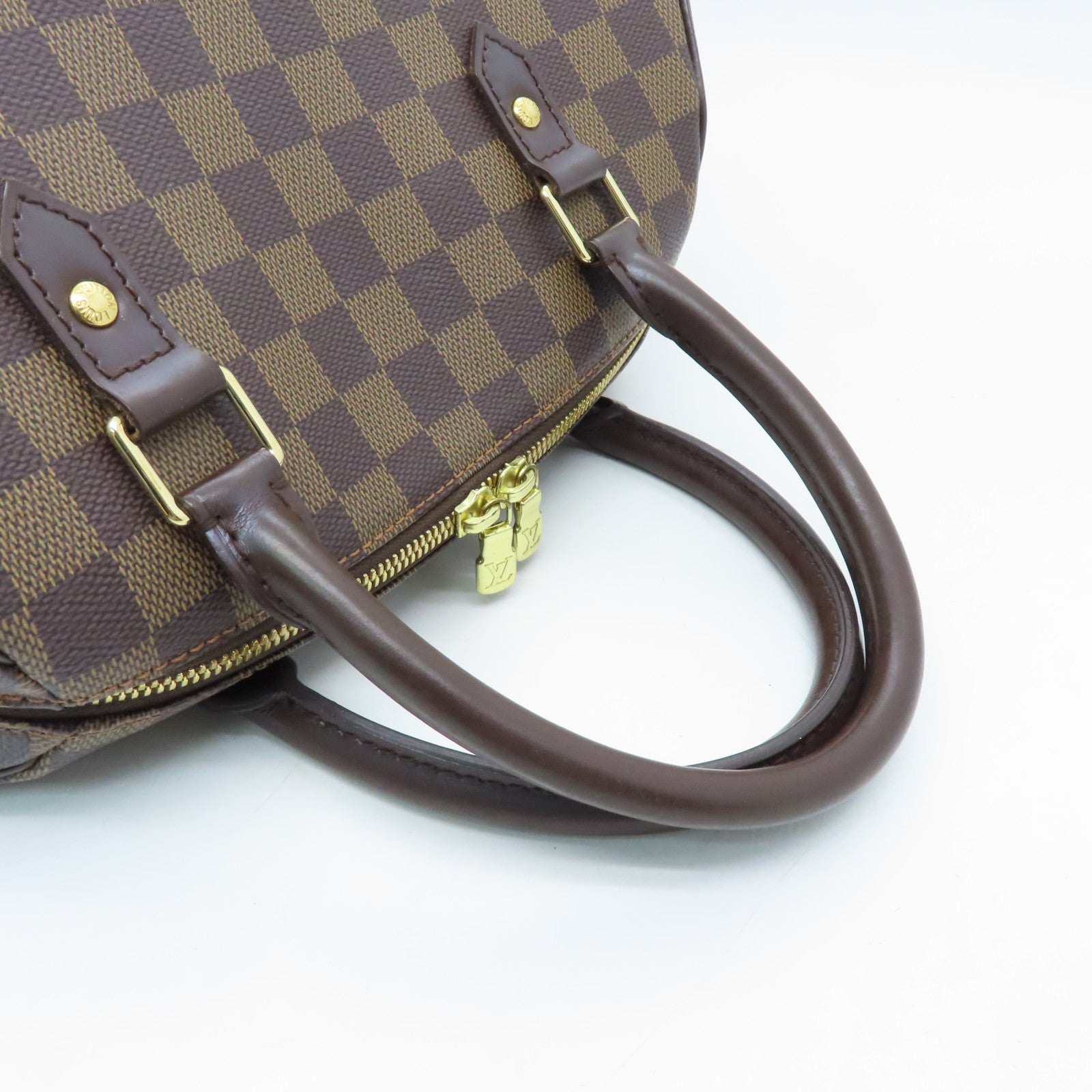LOUIS VUITTON Damier Alma gold buckle handle bag brown