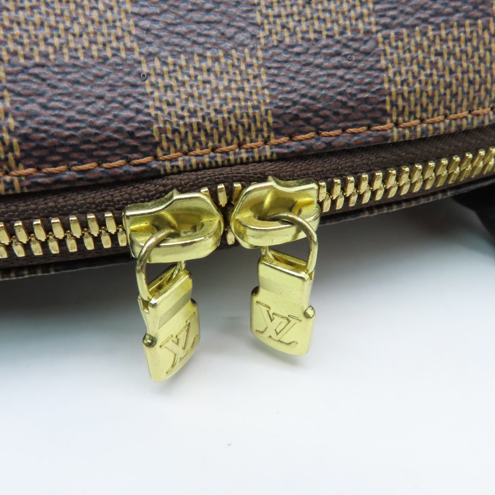 LOUIS VUITTON Damier Alma gold buckle handle bag brown