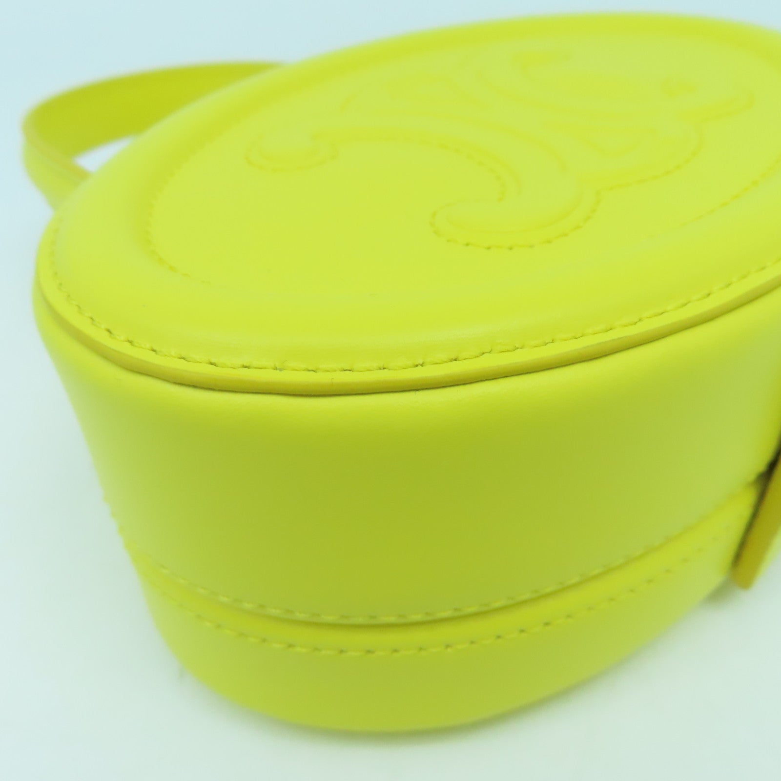 CELINE 牛皮皮革Cuir Triomphe Oval Minaudiere手挽袋黃色