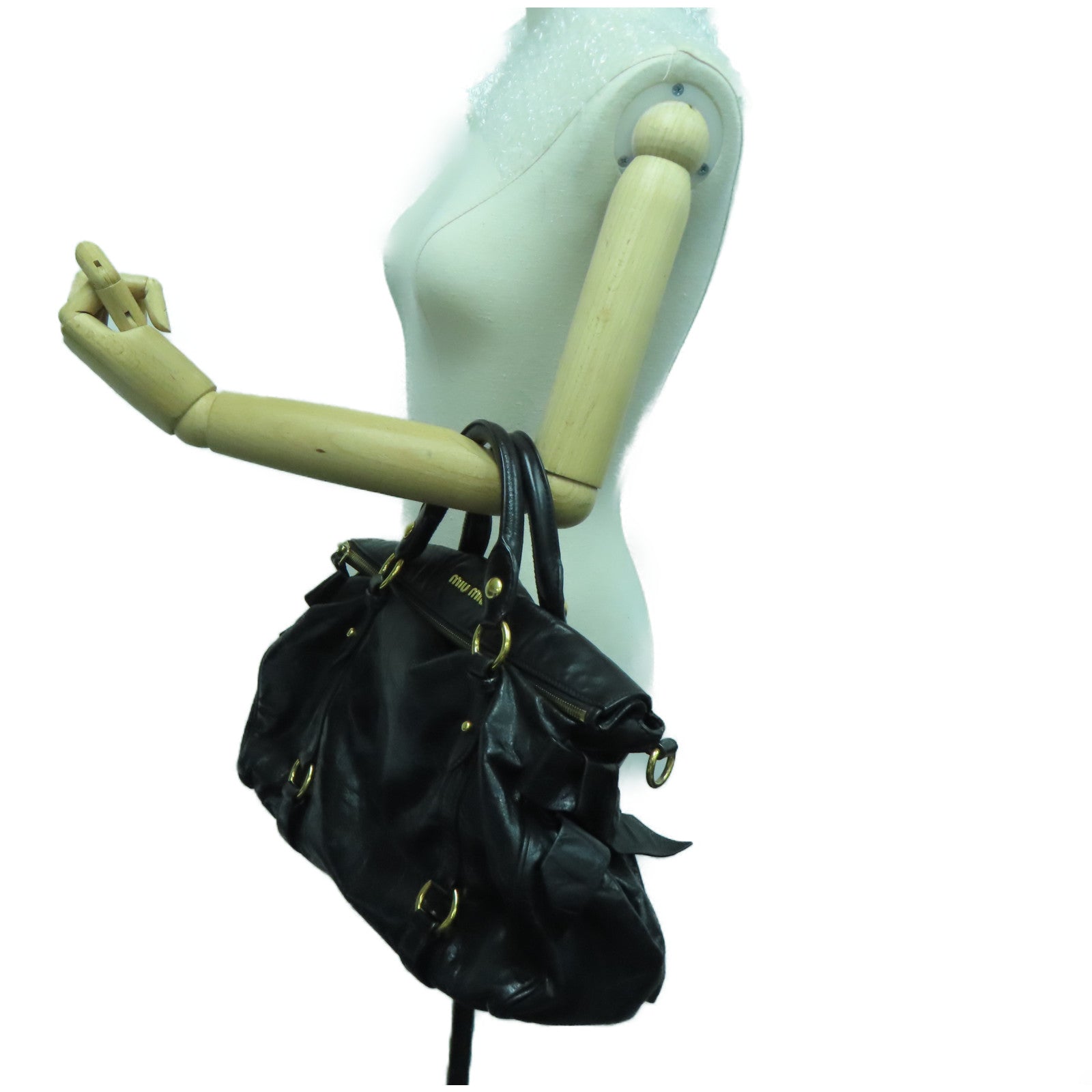 Miu Miu 牛皮皮革Handbag金扣手挽袋黑色