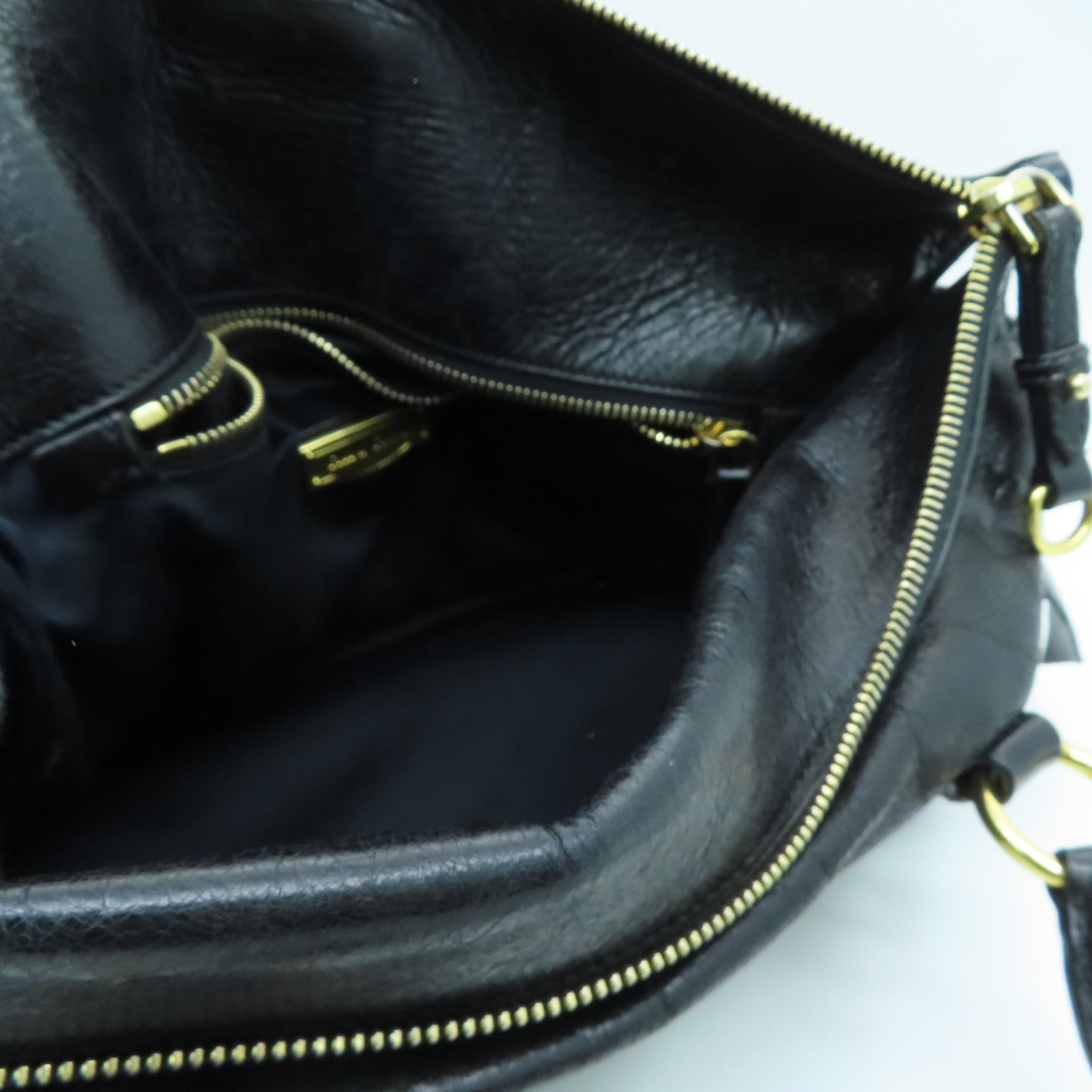 Miu Miu 牛皮皮革Handbag金扣手挽袋黑色