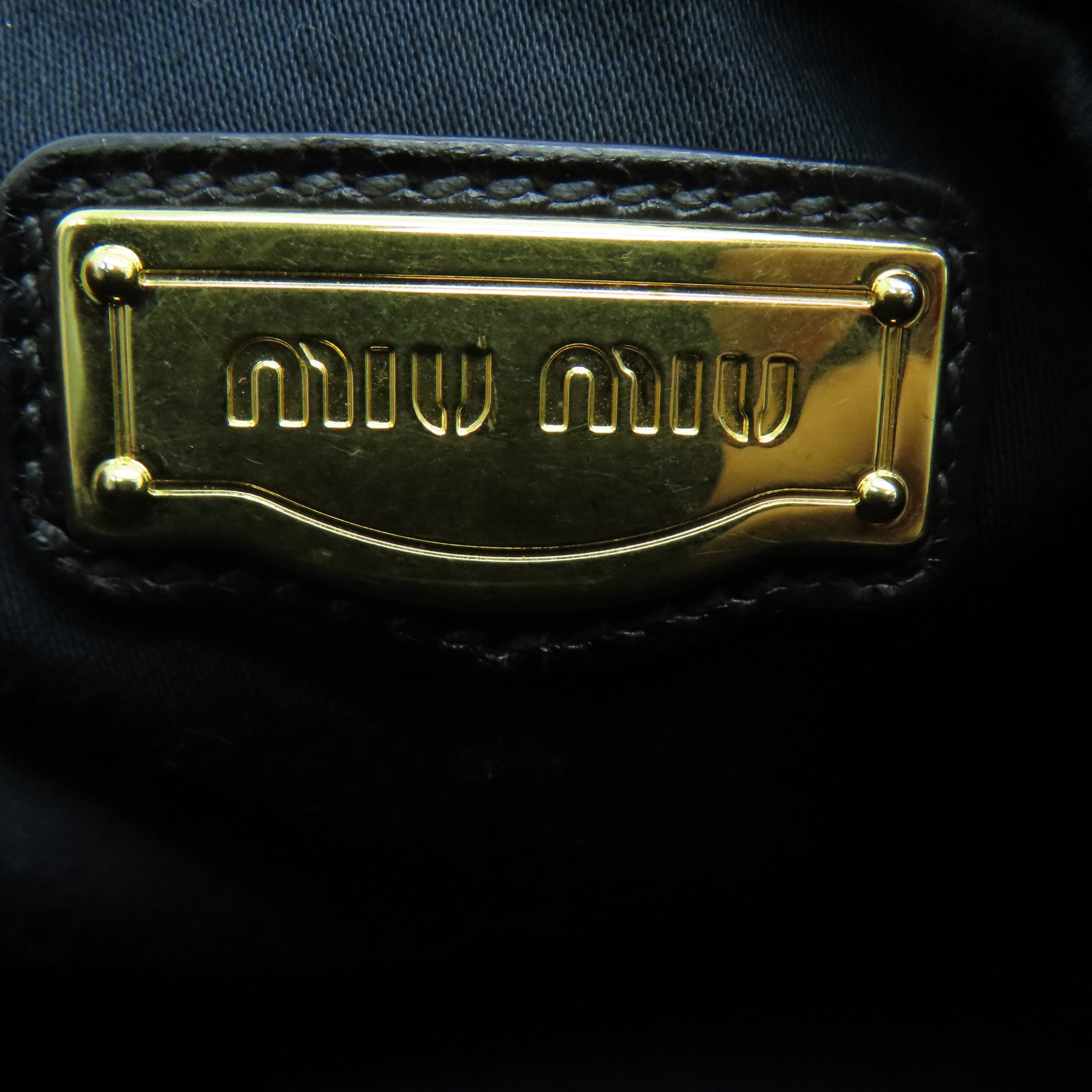 Miu Miu 牛皮皮革Handbag金扣手挽袋黑色