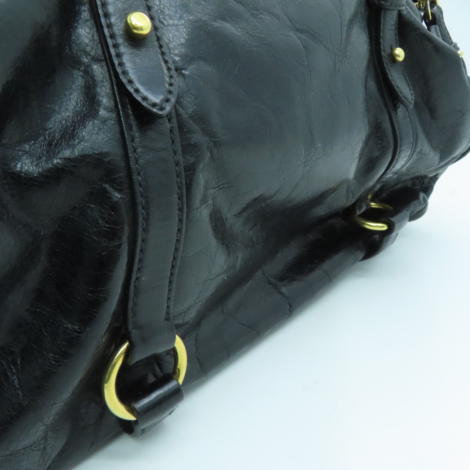 Miu Miu 牛皮皮革Handbag金扣手挽袋黑色