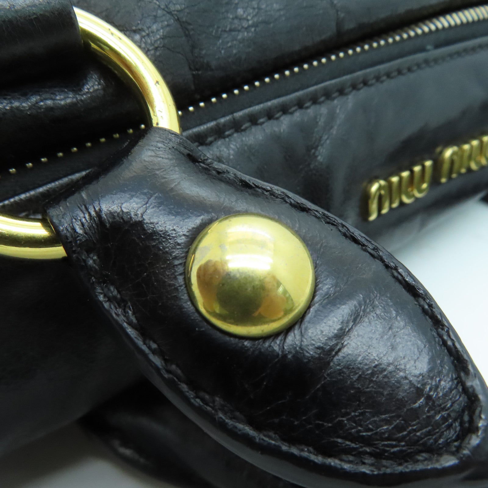 Miu Miu 牛皮皮革Handbag金扣手挽袋黑色
