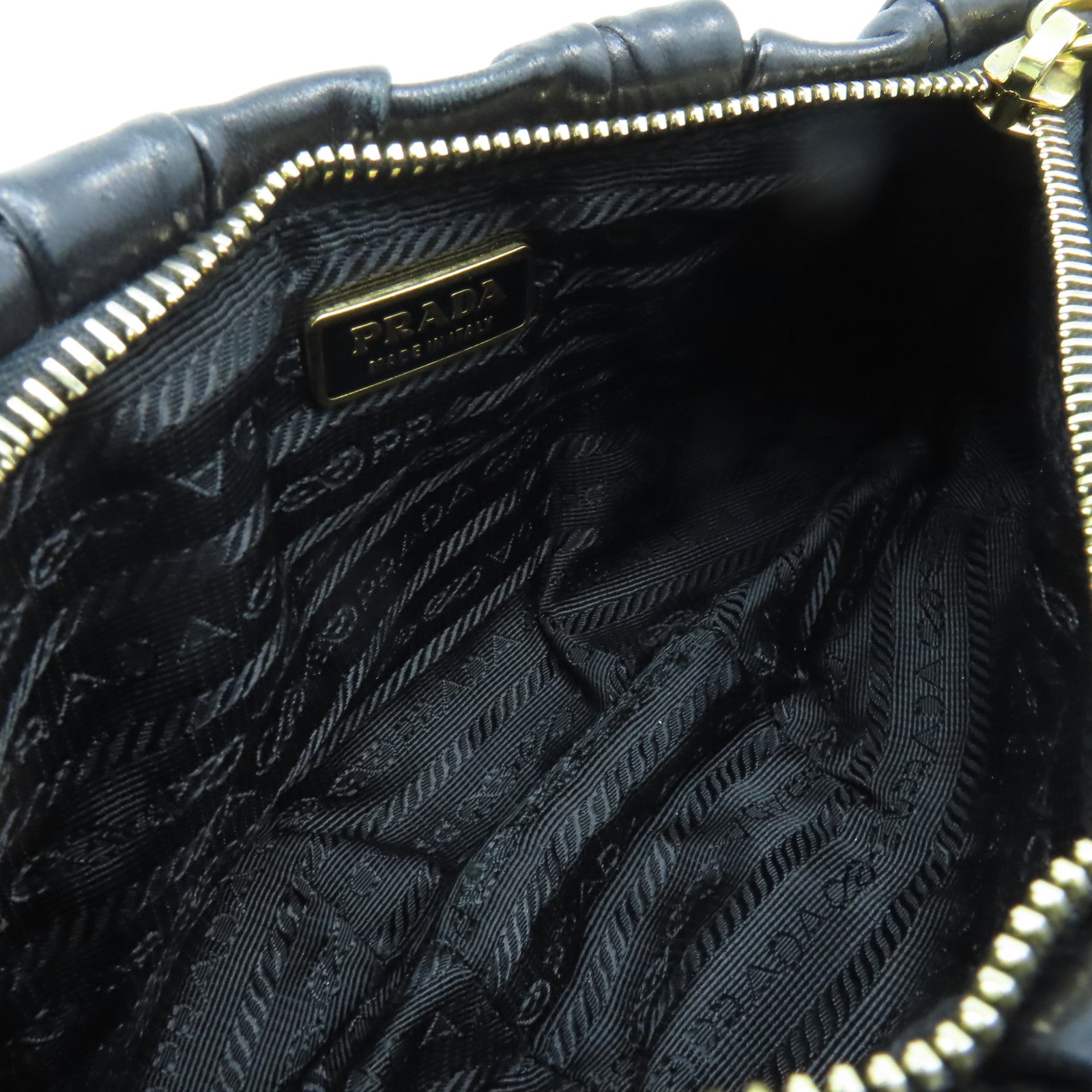 PRADA 牛皮皮革Nappa Gaufre Wristlet金扣手拿包黑色