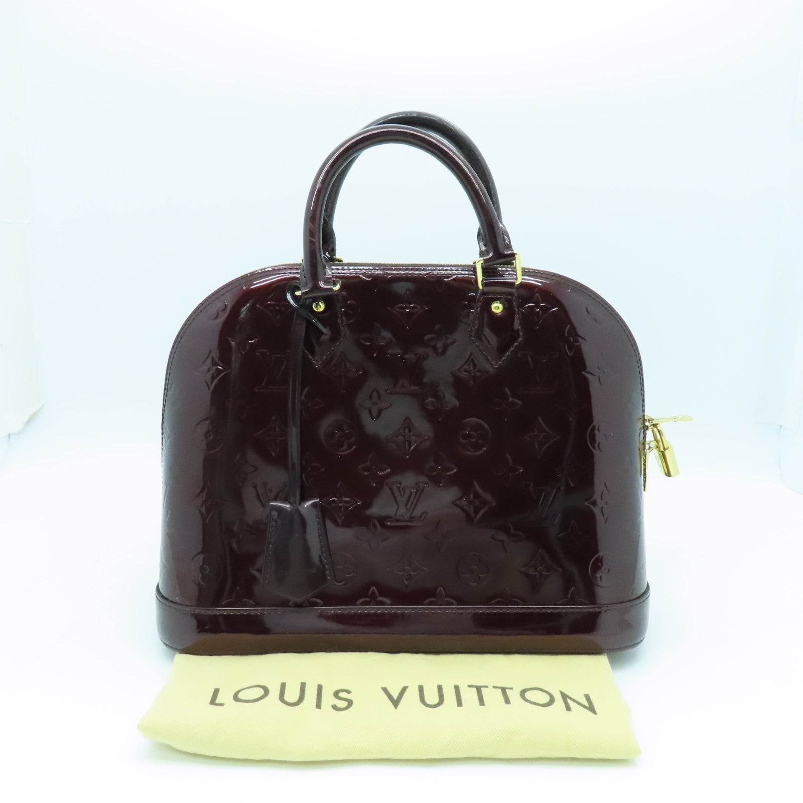 LOUIS VUITTON Monogram Vernis Alma PM gold buckle handle bag crimson