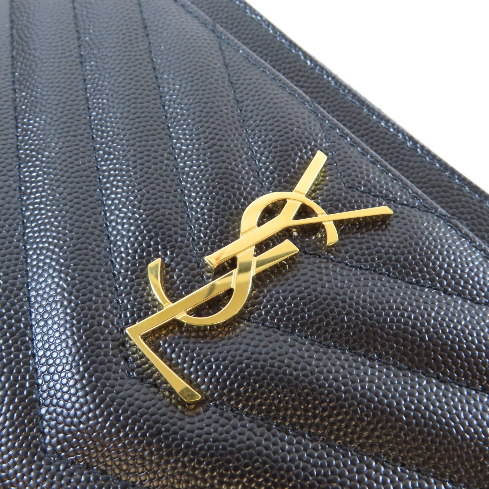 YVES SAINT LAURENT 牛皮皮革Cassandre Matelasse金扣手拿包黑色