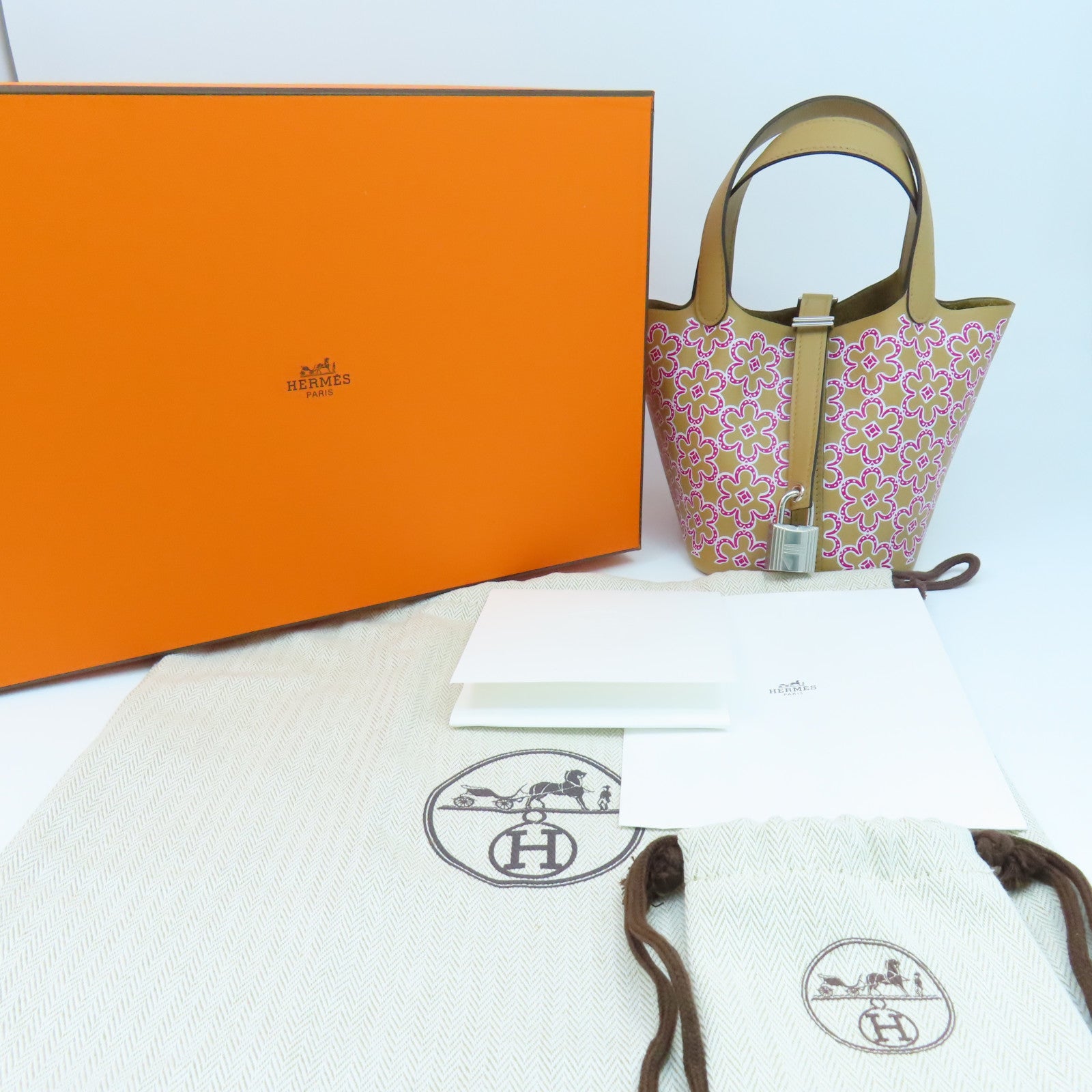 HERMES Swift皮革Picotin Lock Micro银扣手挽袋粉红色
