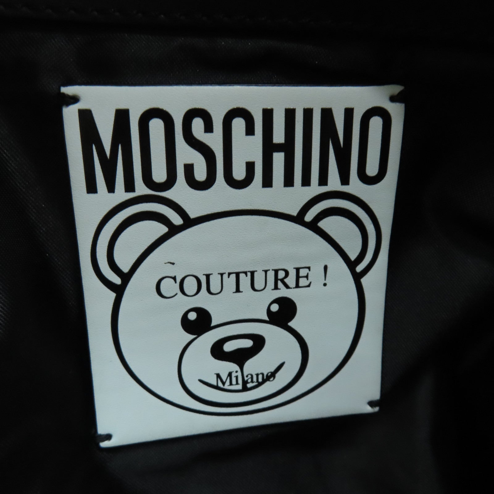 MOSCHINO 塗層帆布Backpack銀扣背包黑色