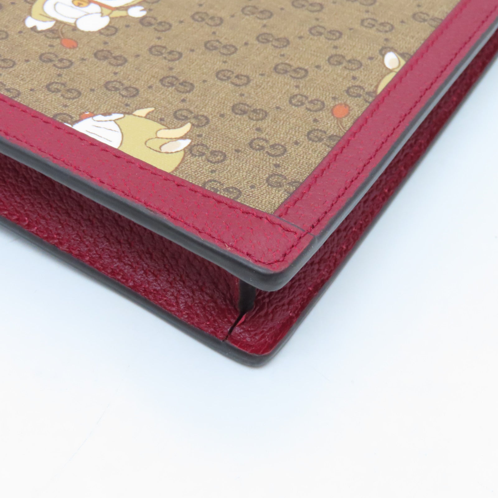 GUCCI 塗層帆布Doraemon Clutch Bag金扣手拿包啡色/紅色