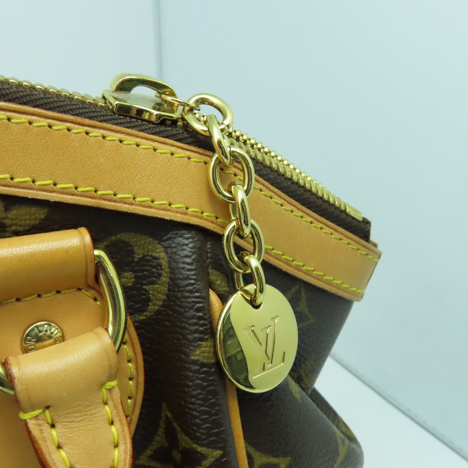 LOUIS VUITTON Monogram Tivoli PM金扣手挽袋啡色