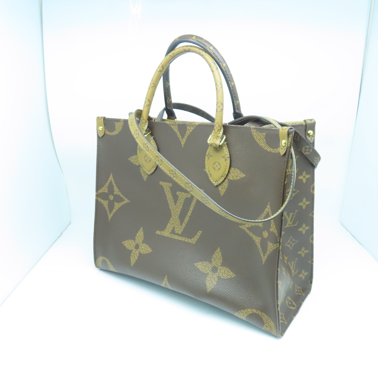 LOUIS VUITTON Monogram On The Go MM gold buckle handle shoulder bag brown