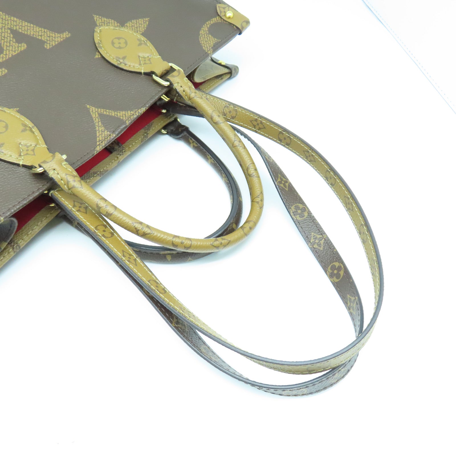 LOUIS VUITTON Monogram On The Go MM gold buckle handle shoulder bag brown