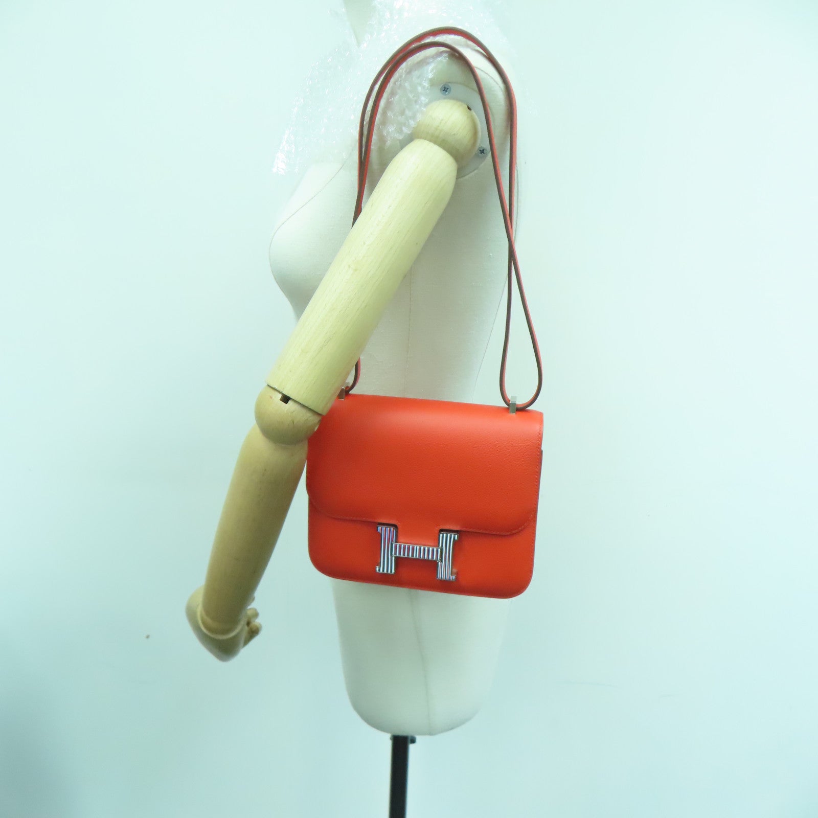 HERMES Evercolor Leather Constance Mini Silver Buckle Shoulder Bag Capucine Orange